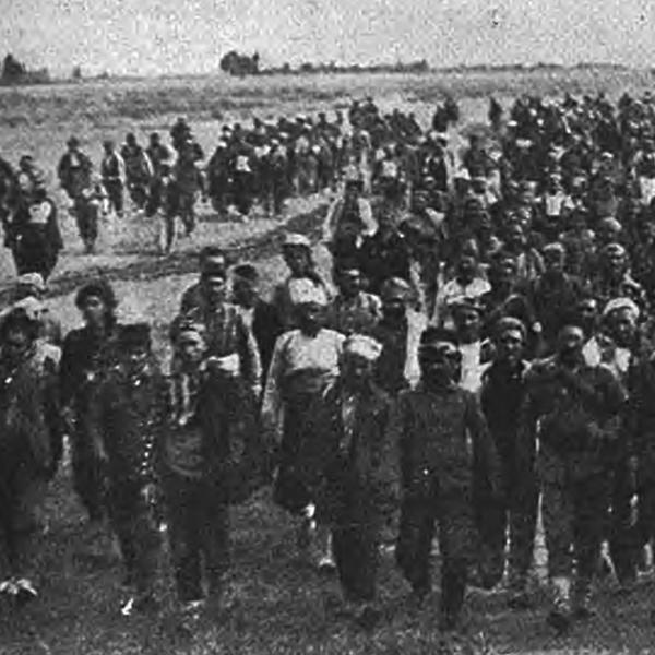 Greek prisoners being marched to an unknown destination.